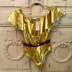 New with tags Stella Cove Gold Swimsuit with Belt in a size 14yrs